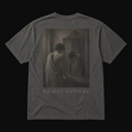 T-shirt with a graphic of a person looking at themselves in a mirror with 'No One Noticed' text on a black background