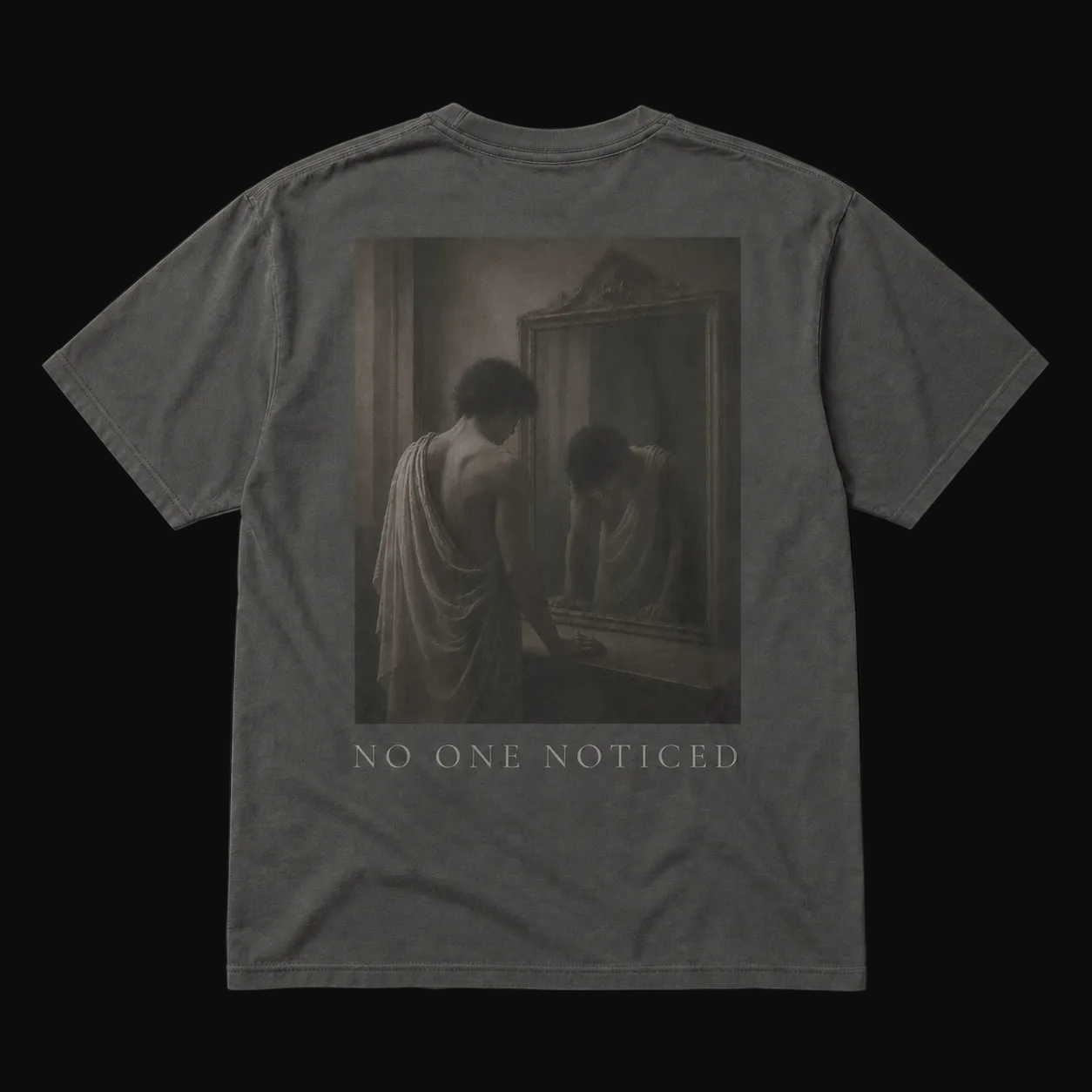 T-shirt with a graphic of a person looking at themselves in a mirror with 'No One Noticed' text on a black background